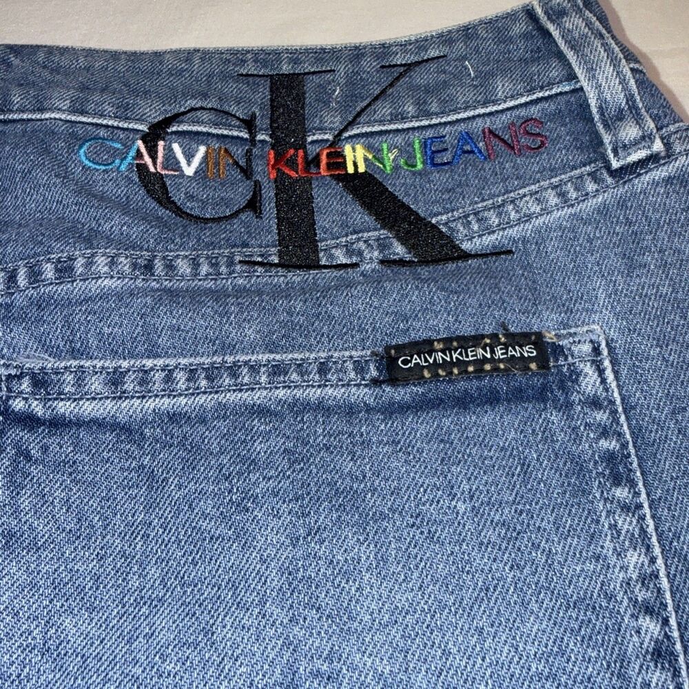 Calvin Klein High Rise Denim Mini Skirt Sz 31 Button Fly Y2K Big Color Logo